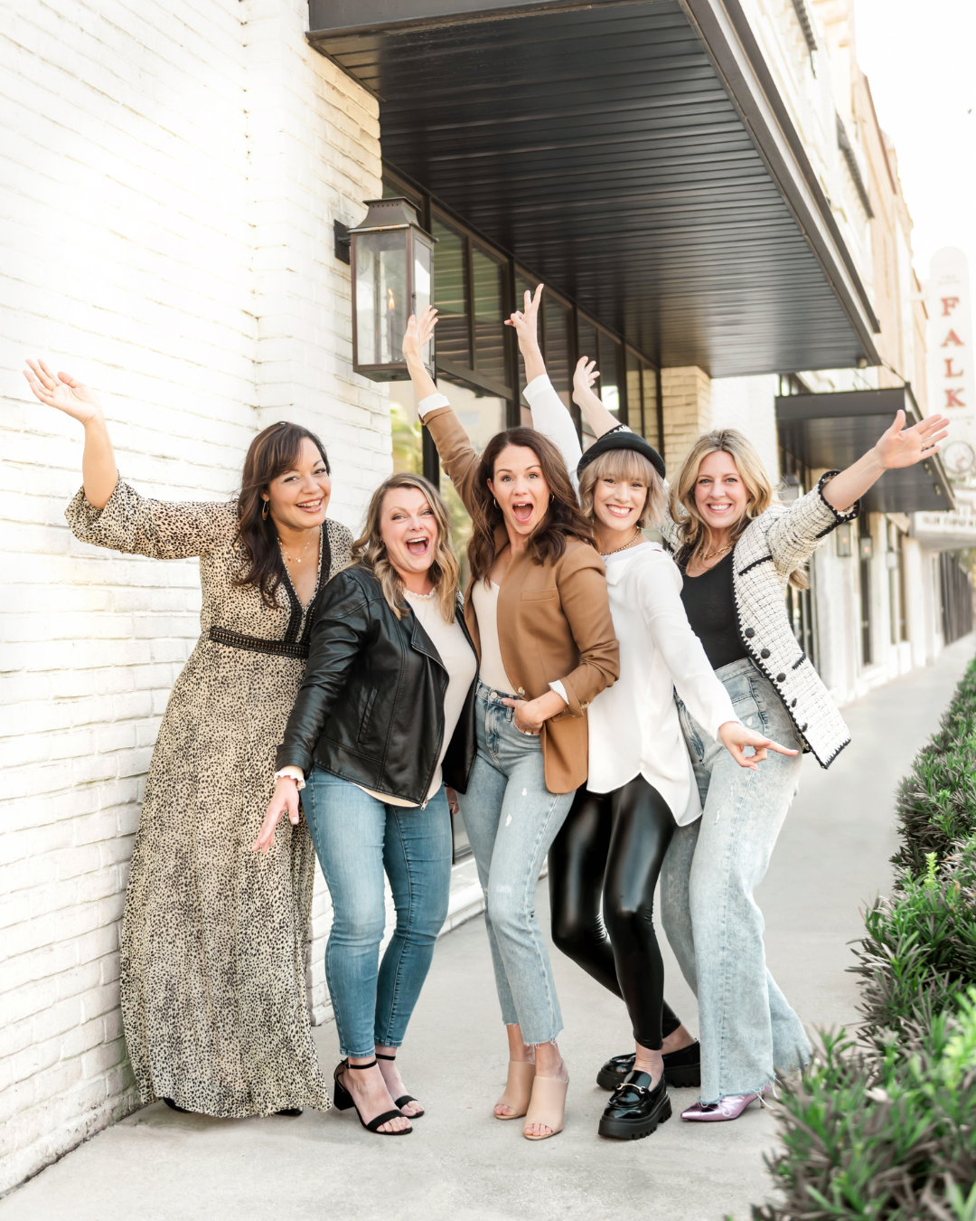 5 female business owners posing in a line. Social Squares team photo